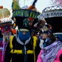 Chinelos, masked dancers, perform in a Candlemas parade in Xochimilco, 2019.